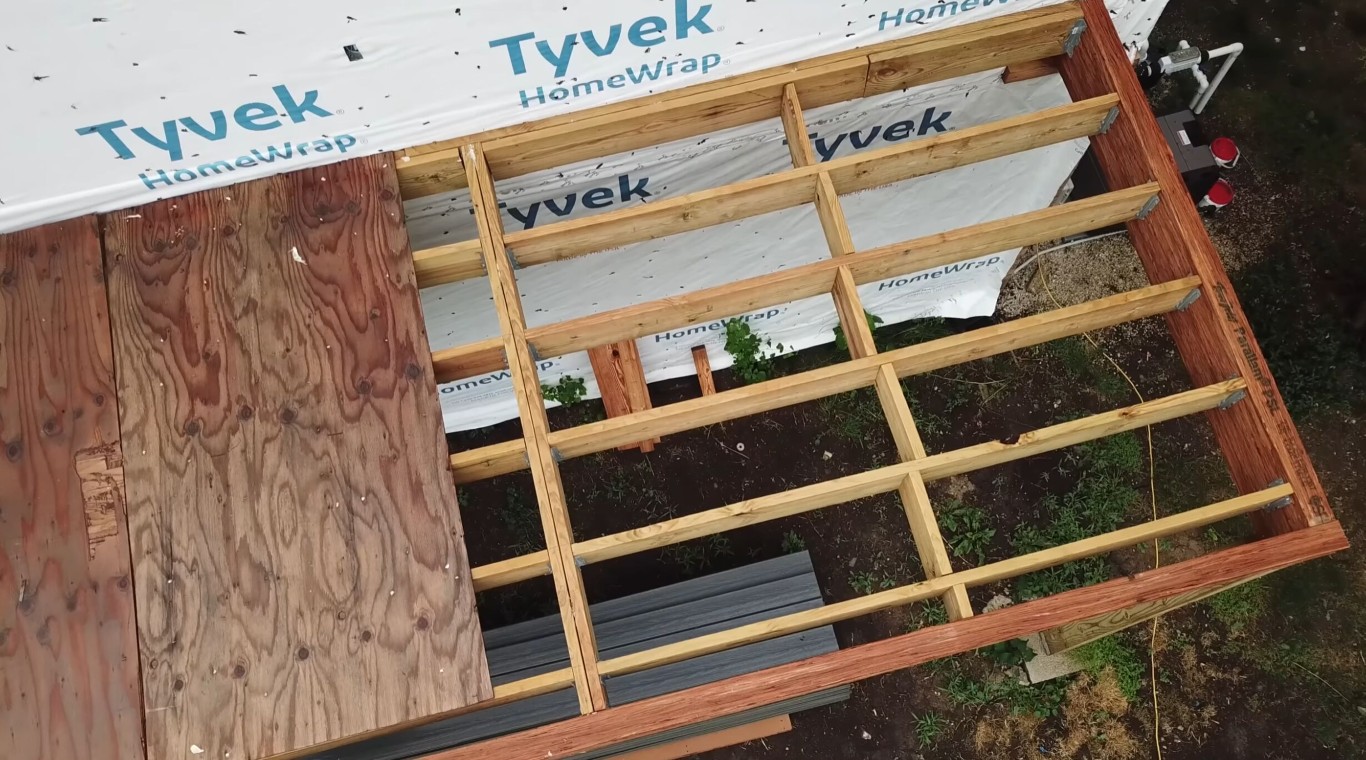 Professional deck framing construction for weather-resistant decks